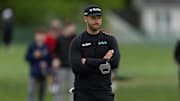 May 9, 2025; Philadelphia, Pennsylvania, USA; Wyndham Clark looks on on the 12th hole during the second round of the Truist Championship golf tournament. Mandatory Credit: Bill Streicher-Imagn Images