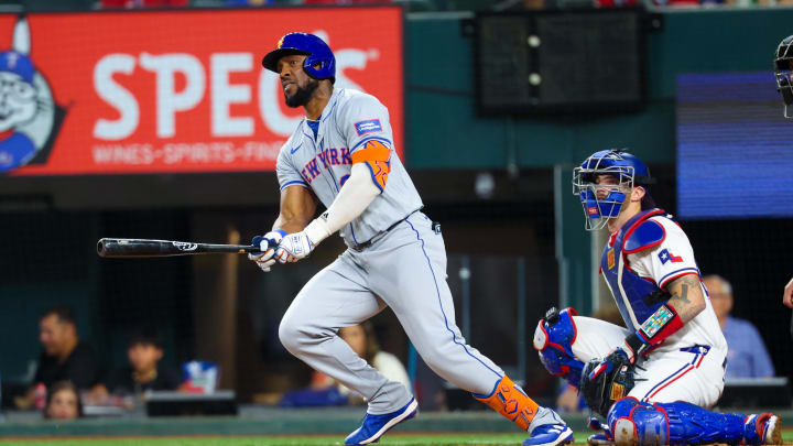 Jun 19, 2024; Arlington, Texas, USA; New York Mets right fielder Starling Marte (6) hits an rbi double during the fourth inning against the Texas Rangers at Globe Life Field. Mandatory Credit: Kevin Jairaj-USA TODAY Sports