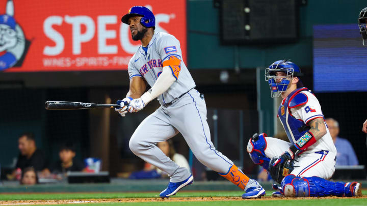 Jun 19, 2024; Arlington, Texas, USA; New York Mets right fielder Starling Marte (6) hits an rbi double during the fourth inning against the Texas Rangers at Globe Life Field. Mandatory Credit: Kevin Jairaj-USA TODAY Sports