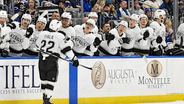 Mar 1, 2025; St. Louis, Missouri, USA;  Los Angeles Kings left wing Kevin Fiala (22) is congratulated by teammates after scoring against the St. Louis Blues during the first period at Enterprise Center. Mandatory Credit: Jeff Curry-Imagn Images