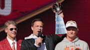 Feb 14, 2024; Kansas City, MO, USA; Kansas City Chiefs general manager Brett Veach speaks as owner Clark Hunt and wife Tavia Hunt and play-by-play announcer Mitch Holthus listen during the celebration of the Chiefs winning Super Bowl LVIII. Mandatory Credit: Kirby Lee-Imagn Images