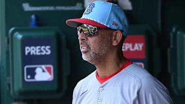 Boston Red Sox manager Alex Cora (13) stands in the dugout during the eighth inning of a game against the Washington Nationals at Nationals Park.
