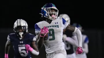 Waden Charles (9) of Somerset Academy-Canyons breaks free for a 79-yard touchdown in the second half