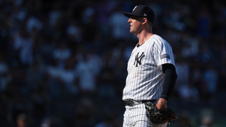 Aug 11, 2024; Bronx, New York, USA; New York Yankees relief pitcher Clay Holmes (35) reacts after a pitch during the ninth inning against the Texas Rangers at Yankee Stadium. Mandatory Credit: Vincent Carchietta-USA TODAY Sports