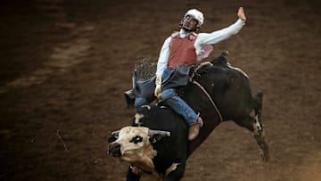 Tate Pollmeier of Fort Scott, Kan., competes in bull riding on night one of the St. Paul Rodeo on Tuesday, July 1, 2025 in St. Paul.