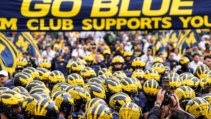 Michigan players huddle before kickoff against Texas at Michigan Stadium in Ann Arbor on Saturday, September 7, 2024.