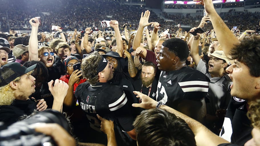 Mississippi State players and fans celebrate a win over Arizona State.