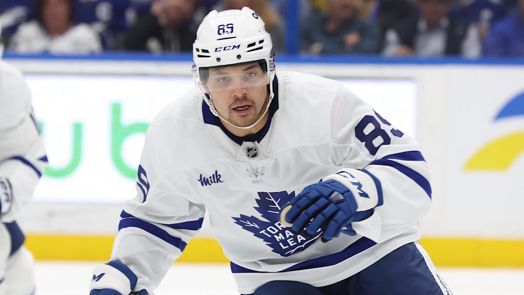 Apr 9, 2025; Tampa, Florida, USA; Toronto Maple Leafs left wing Nicholas Robertson (89) skates against the Tampa Bay Lightning during the first period at Amalie Arena. 