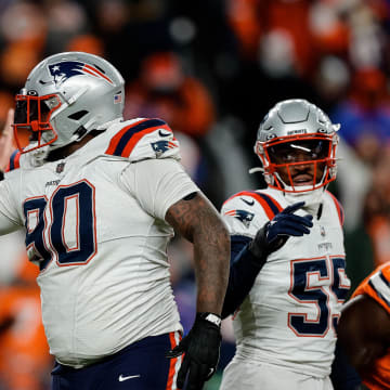 Dec 24, 2023; Denver, Colorado, USA; New England Patriots defensive tackle Christian Barmore (90) reacts after a play ]in the third quarter against the Denver Broncos at Empower Field at Mile High. Mandatory Credit: Isaiah J. Downing-USA TODAY Sports
