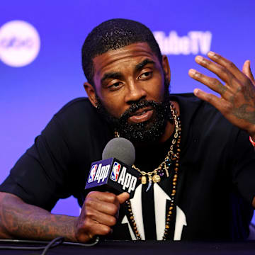 Jun 5, 2024; Boston, MA, USA;  Dallas Mavericks guard Kyrie Irving (11) during the NBA Finals Media Day at TD Garden. Mandatory Credit: Peter Casey-Imagn Images