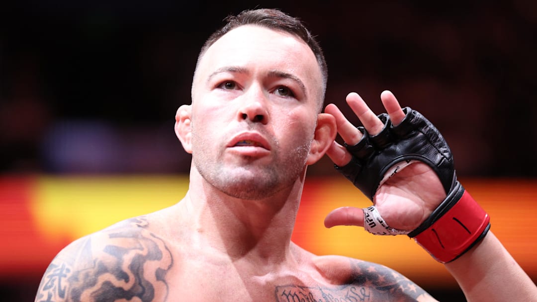 Dec 14, 2024; Tampa, Florida, UNITED STATES;  Colby Covington (red gloves) before the fight against Joaquin Buckley (blue gloves) at Amalie Arena. Mandatory Credit: Nathan Ray Seebeck-Imagn Images