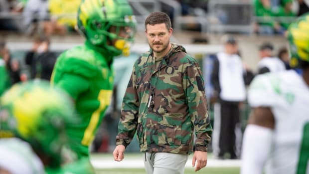 Oregon head coach Dan Lanning walks the field during the Oregon Ducks’ Spring Game 