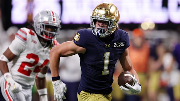 Jaden Greathouse runs after making a catch for Notre Dame against Ohio State in the National Championship game