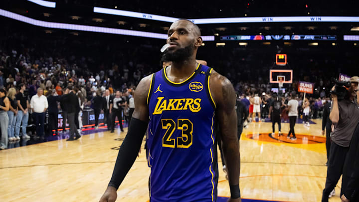 LeBron James walks off the court after the Lakers’ first loss of the season. LeBron James walks off the court after the Lakers’ first loss of the season.