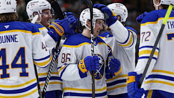 Nov 29, 2025; Saint Paul, Minnesota, USA; Buffalo Sabres center Noah Ostlund (86) is congratulated for his game winning shootout goal against the Minnesota Wild at Grand Casino Arena. Mandatory Credit: Matt Krohn-Imagn Images