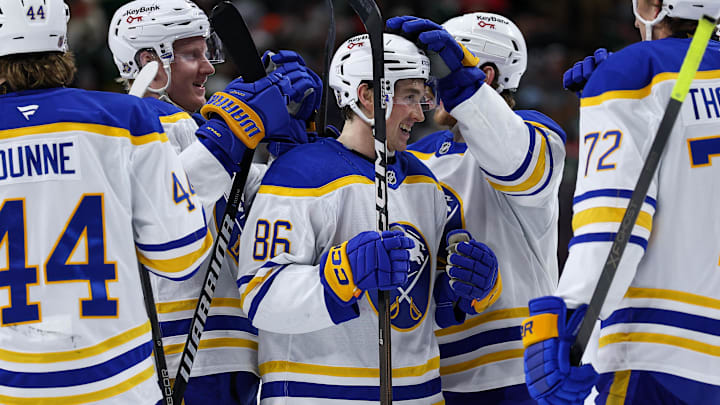 Nov 29, 2025; Saint Paul, Minnesota, USA; Buffalo Sabres center Noah Ostlund (86) is congratulated for his game winning shootout goal against the Minnesota Wild at Grand Casino Arena. Mandatory Credit: Matt Krohn-Imagn Images