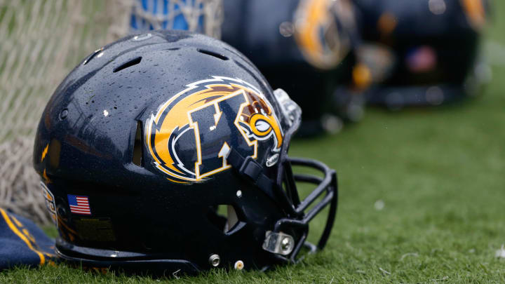 Oct 3, 2015; Kent, OH, USA; A Kent State Golden Flashes helmet on from the sidelines during the game of the Miami (Oh) Redhawks against the Kent State Golden Flashes at Dix Stadium. Mandatory Credit: Aaron Doster-USA TODAY Sports