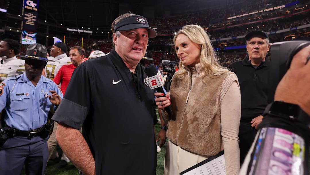 Nov 28, 2025; Atlanta, Georgia, USA; Georgia Bulldogs head coach Kirby Smart talks to reporter Katie George after a victory over the Georgia Tech Yellow Jackets at Mercedes-Benz Stadium. Mandatory Credit: Brett Davis-Imagn Images
