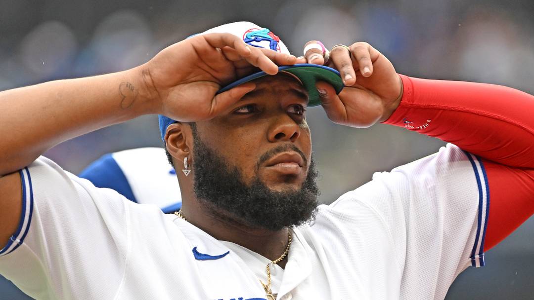 Aug 30, 2026; Toronto, Ontario, CAN;  Toronto Blue Jays first baseman Vladimir Guerrero Jr. (27) adjusts his cap as he prepares to play the Seattle Mariners at Rogers Centre.  Mandatory Credit: Dan Hamilton-Imagn Images