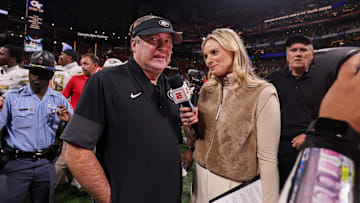 Nov 28, 2025; Atlanta, Georgia, USA; Georgia Bulldogs head coach Kirby Smart talks to reporter Katie George after a victory over the Georgia Tech Yellow Jackets at Mercedes-Benz Stadium. Mandatory Credit: Brett Davis-Imagn Images
