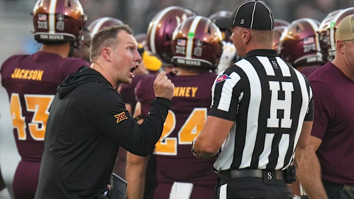 Arizona State head coach Kenny Dillingham yells at a referee on the sidelines during their game against the Kansas Jayhawks at Mountain America Stadium in Tempe on Oct 5, 2024. Arizona State head coach Kenny Dillingham yells at a referee on the sidelines during their game against the Kansas Jayhawks at Mountain America Stadium in Tempe on Oct 5, 2024.