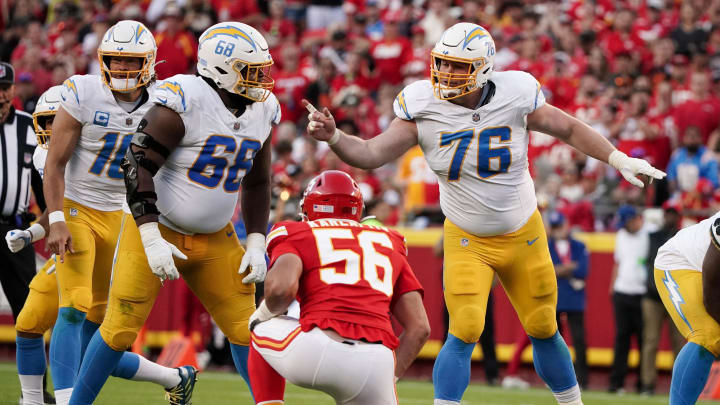 Oct 12, 2023; Kansas City, Missouri, USA; Los Angeles Chargers center Will Clapp (76) gestures at the line of scrimmage against the Kansas City Chiefs during the game at GEHA Field at Arrowhead Stadium. Mandatory Credit: Denny Medley-USA TODAY Sports