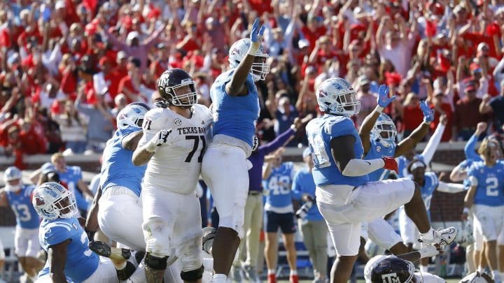 Nov 4, 2023; Oxford, Mississippi, USA; Mississippi Rebels defensive linemen Zxavian Harris (51) and JJ Pegues (89) watch as the Texas A&M Aggies last second field goal attempt misses during the second half at Vaught-Hemingway Stadium. Mandatory Credit: Petre Thomas-USA TODAY Sports