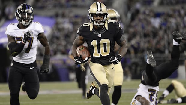 Aug 13, 2015; New Orleans Saints wide receiver Brandin Cooks (10) breaks a big gain against the Baltimore Ravens 