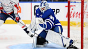 Dec 28, 2024; Toronto, Ontario, CAN; Toronto Maple Leafs goalie Matt Murray (30) makes a save against the Capitals forward in the first period at Scotiabank Arena. Mandatory Credit: Dan Hamilton-Imagn Images