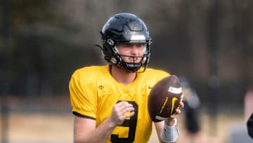 Iowa’s Hank Brown looks on before throwing a pass during practice at Ensworth School in Nashville, Tenn., Friday, Dec. 27, 2024.