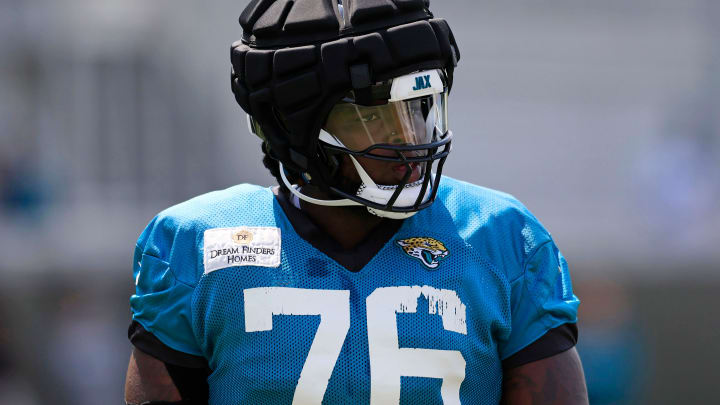 Jacksonville Jaguars offensive tackle Anton Harrison (76) warms up Monday, Aug. 14, 2023 at Miller Electric Center at EverBank Stadium in Jacksonville, Fla. Today was the 14th training camp session.