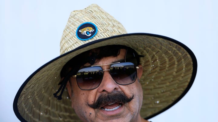 Owner Shad Khan talks on the sideline Wednesday, July 26, 2023 at Miller Electric Center at EverBank Stadium in Jacksonville, Fla. Today marked the first day of training camp for the Jacksonville Jaguars.