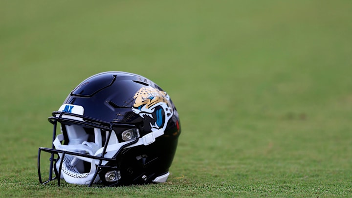 A Jacksonville Jaguars helmet lies on the turf Wednesday, July 26, 2023 at Miller Electric Center at EverBank Stadium in Jacksonville, Fla. Today marked the first day of training camp for the Jacksonville Jaguars.