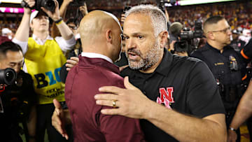 Matt Rhule and P.J. Fleck after the game at Huntington Bank Stadium. 
