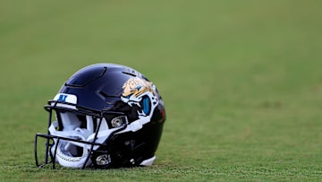 A Jacksonville Jaguars helmet lies on the turf Wednesday, July 26, 2023 at Miller Electric Center at EverBank Stadium in Jacksonville, Fla. Today marked the first day of training camp for the Jacksonville Jaguars.