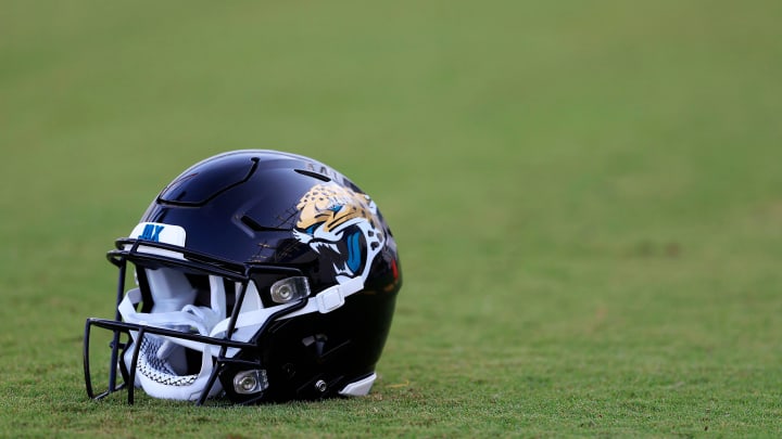 A Jacksonville Jaguars helmet lies on the turf Wednesday, July 26, 2023 at Miller Electric Center at EverBank Stadium in Jacksonville, Fla. Today marked the first day of training camp for the Jacksonville Jaguars.