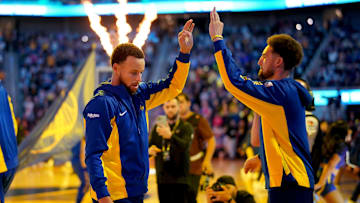 Nov 1, 2023; San Francisco, California, USA; Golden State Warriors guard Stephen Curry (30) exchanges high fives with guard Klay Thompson (11) before the start of the game against the Sacramento Kings at the Chase Center. Mandatory Credit: Cary Edmondson-Imagn Images