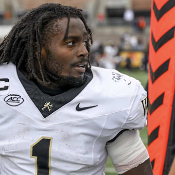 Oct 11, 2025; Corvallis, Oregon, USA; Wake Forest Demon Deacons running back Demond Claiborne (1) celebrates on the sideline after a long touchdown run in the second half against the Oregon State Beavers at Reser Stadium. 