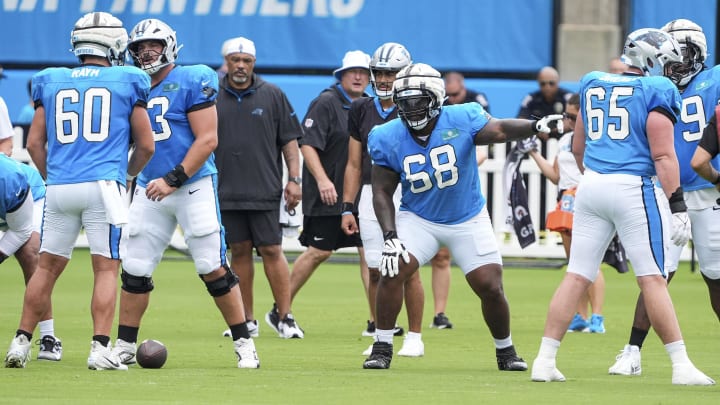 Jul 30, 2024; Charlotte, NC, USA;Carolina Panthers guard Damien Lewis (68) calls out to his line during training camp at Carolina Panthers Practice Fields. Mandatory Credit: Jim Dedmon-USA TODAY Sports