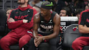 Jan 2, 2025; Miami, Florida, USA;  Miami Heat forward Jimmy Butler (22) looks on from the bench during the second half at Kaseya Center. Mandatory Credit: Jim Rassol-Imagn Images