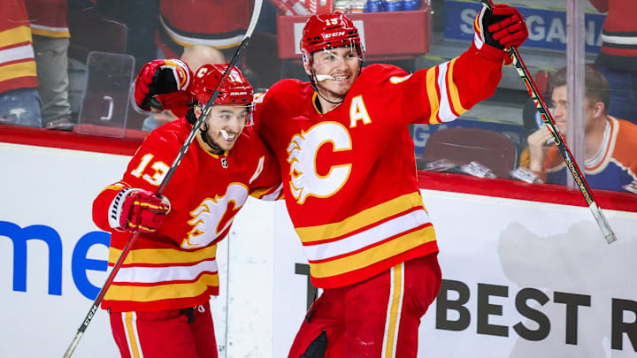 May 18, 2022; Calgary, Alberta, CAN; Calgary Flames left wing Matthew Tkachuk (19) celebrates his goal with left wing Johnny Gaudreau (13) during the third period against the Edmonton Oilers in game one of the second round of the 2022 Stanley Cup Playoffs at Scotiabank Saddledome. Mandatory Credit: Sergei Belski-Imagn Images May 18, 2022; Calgary, Alberta, CAN; Calgary Flames left wing Matthew Tkachuk (19) celebrates his goal with left wing Johnny Gaudreau (13) during the third period against the Edmonton Oilers in game one of the second round of the 2022 Stanley Cup Playoffs at Scotiabank Saddledome. Mandatory Credit: Sergei Belski-Imagn Images
