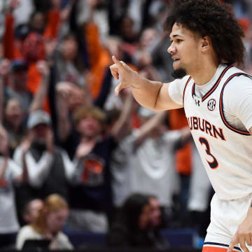Mar 17, 2024; Nashville, TN, USA; Auburn Tigers guard Tre Donaldson (3) reacts after a play in the second half against the Florida Gators in the SEC Tournament championship game at Bridgestone Arena. Mandatory Credit: Christopher Hanewinckel-USA TODAY Sports