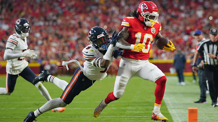Aug 22, 2025; Kansas City, Missouri, USA; Kansas City Chiefs running back Isiah Pacheco (10) is pushed out of bounds by Chicago Bears safety Jaquan Brisker (9) during the first half at GEHA Field at Arrowhead Stadium. Mandatory Credit: Jay Biggerstaff-Imagn Images