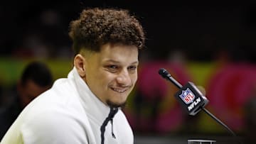 Feb 3, 2025; New Orleans, LA, USA; Kansas City Chiefs quarterback Patrick Mahomes (15) talks to the media during Super Bowl LIX Opening Night at Ceasars Superdome. Mandatory Credit: Stephen Lew-Imagn Images