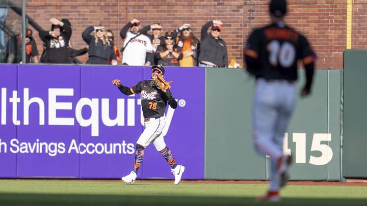 May 26, 2026; San Francisco, California, USA; San Francisco Giants right fielder Victor Bericoto (78) fields a fly ball against the Arizona Diamondbacks d1i at Oracle Park. Mandatory Credit: Neville E. Guard-Imagn Images