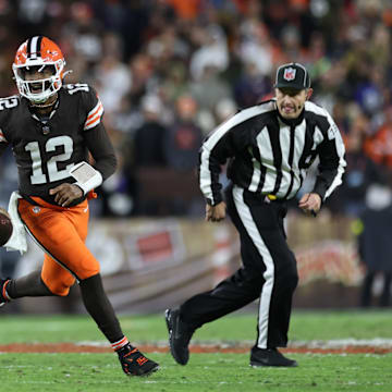 Nov 16, 2025; Cleveland, Ohio, USA; Cleveland Browns quarterback Shedeur Sanders (12) runs for a gain during the fourth quarter against the Baltimore Ravens at Huntington Bank Field. Mandatory Credit: Scott Galvin-Imagn Images