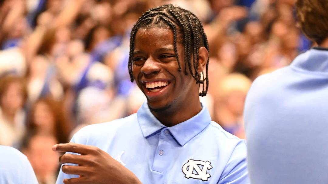 Mar 7, 2026; Durham, North Carolina, USA; Injured North Carolina Tar Heels foward Caleb Wilson jokes with teammates prior to a game against the Duke Blue Devils at Cameron Indoor Stadium.  The Duke Blue Devils won 76-61. Mandatory Credit: Rob Kinnan-Imagn Images