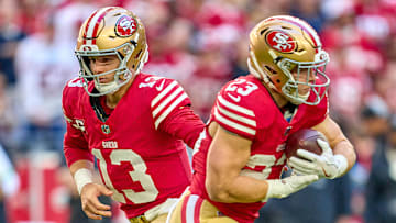 San Francisco 49ers quarterback Brock Purdy (L) and running back Christian McCaffrey (R)