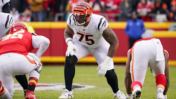 Dec 31, 2023; Kansas City, Missouri, USA; Cincinnati Bengals offensive tackle Orlando Brown Jr. (75) at the line of scrimmage against the Kansas City Chiefs during the game at GEHA Field at Arrowhead Stadium. Mandatory Credit: Denny Medley-Imagn Images