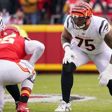 Dec 31, 2023; Kansas City, Missouri, USA; Cincinnati Bengals offensive tackle Orlando Brown Jr. (75) at the line of scrimmage against the Kansas City Chiefs during the game at GEHA Field at Arrowhead Stadium. Mandatory Credit: Denny Medley-Imagn Images